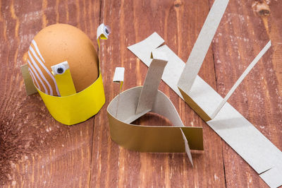 High angle view of toy on wooden table