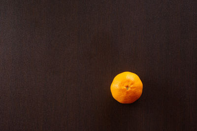 Directly above shot of orange slice on table