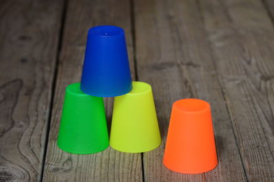 Close-up of multi colored bottles on table