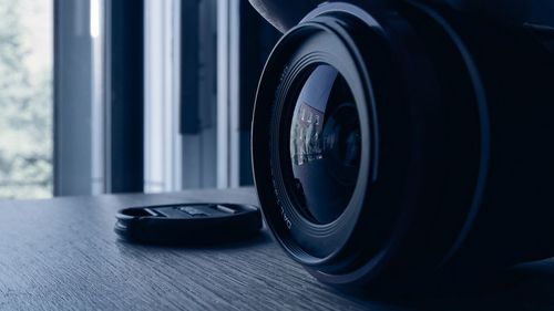 Close-up of camera on table