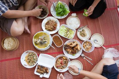 High angle view of people having food