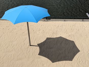 High angle view of umbrella on beach