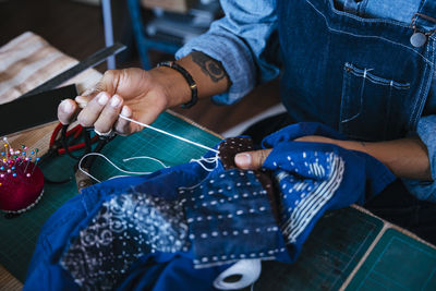 High angle view of man working on table