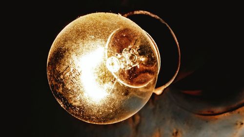 Close-up of illuminated light bulb