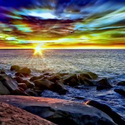 Scenic view of sea at sunset