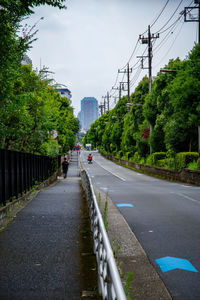 Empty road against sky