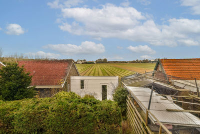 High angle view of buildings against sky