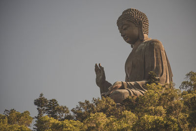 Low angle view of statue against clear sky