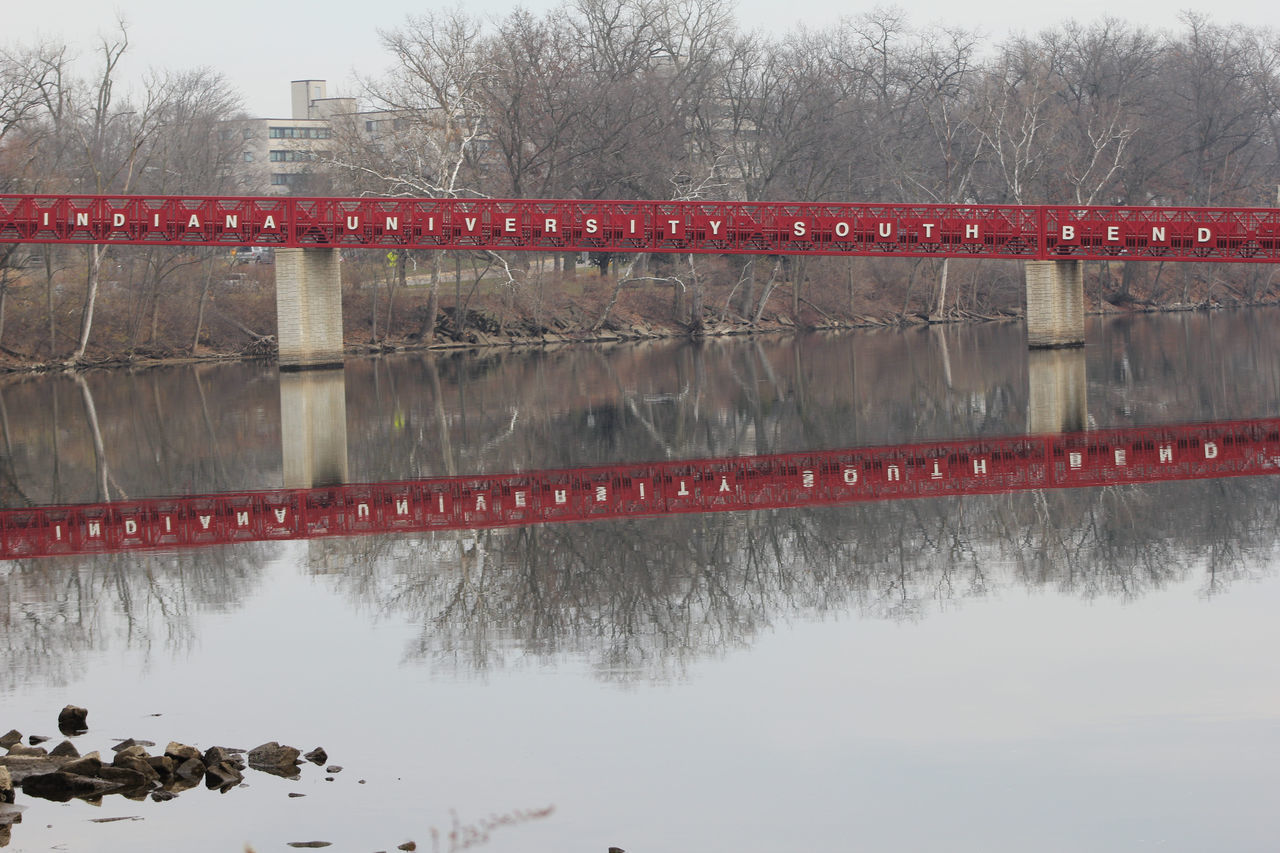 REFLECTION OF BRIDGE IN LAKE