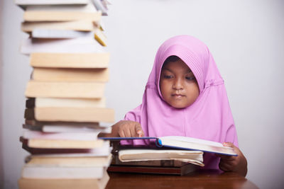 Portrait of girl in book