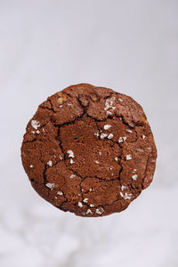 Close-up of chocolate cake against white background