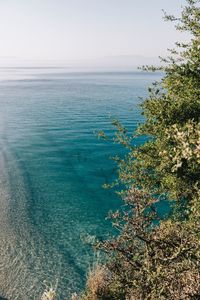 Scenic view of sea against clear blue sky