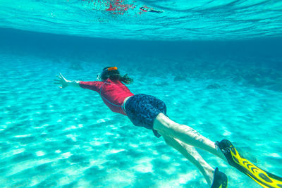 Man swimming in sea