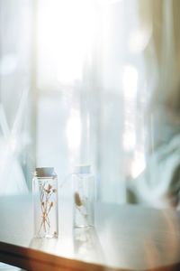 Close-up of glass window on table