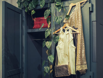 Clothes hanging on cabinet at home