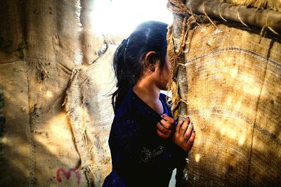 Close-up of young woman standing outdoors