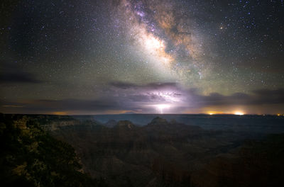 Scenic view of sea against sky at night