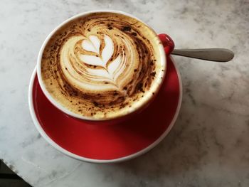 High angle view of cappuccino on table