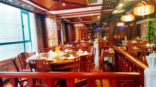 Chairs and table in illuminated room