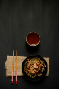 High angle view of food on table against black background