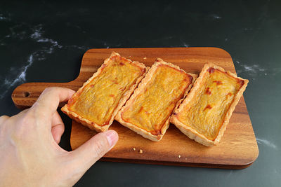 High angle view of person holding bread