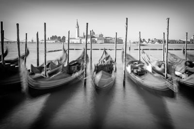 View of boats moored in water