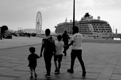 Rear view of people on town square