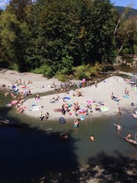 High angle view of people enjoying in water