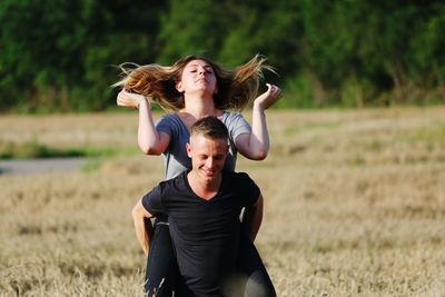 Happy couple on field