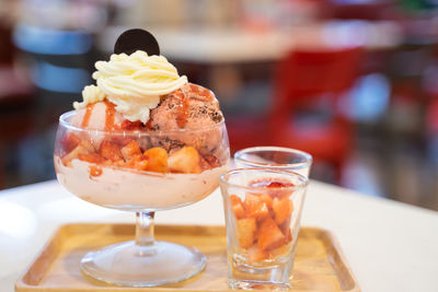 Close-up of ice cream in glass on table