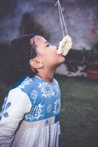 Close-up of girl looking at camera