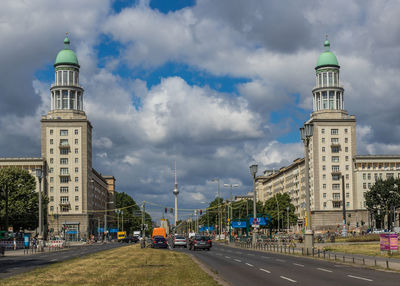 View of buildings against cloudy sky