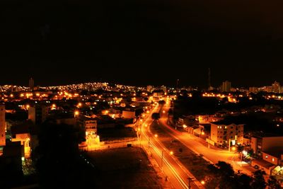 Illuminated cityscape at night