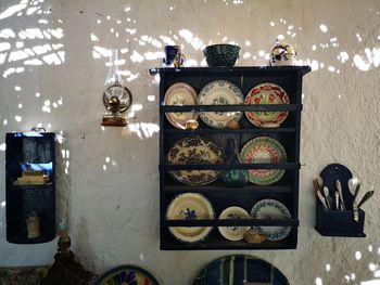 High angle view of objects on table against wall