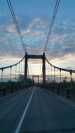 View of bridge against cloudy sky