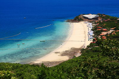 High angle view of swimming pool by sea against sky