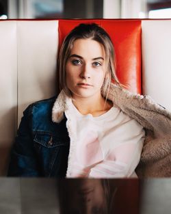 Portrait of smiling woman at home