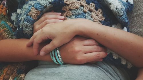 Couple lying on bed at home