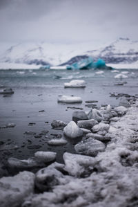 Surface level of frozen sea against sky