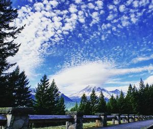 Scenic view of mountains against cloudy sky