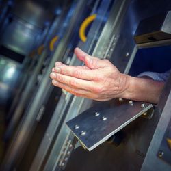 Cropped image of man in prison