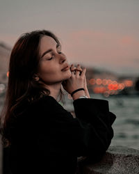 Young woman drinking glass