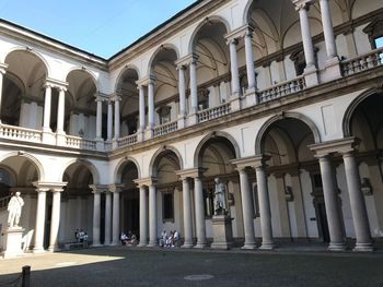 Facade of historic building against sky