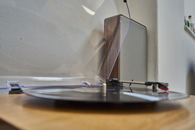 Close-up of working on table at home