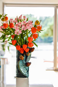 Close-up of flowers in vase at home