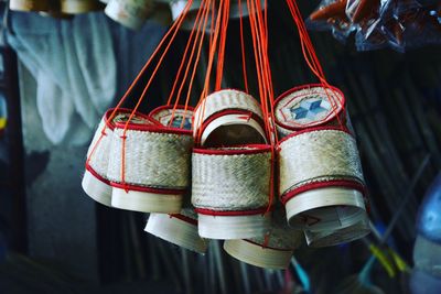 Close-up of baskets hanging at market