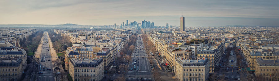 Aerial view of cityscape against sky