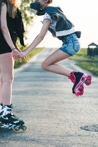 Low section of people on skateboard