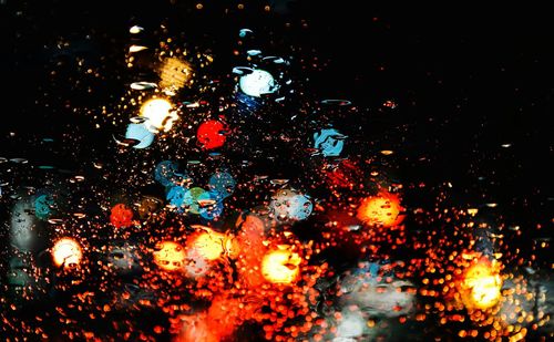 Full frame shot of wet glass window in rainy season