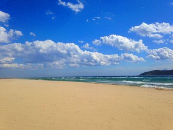 Scenic view of beach against sky